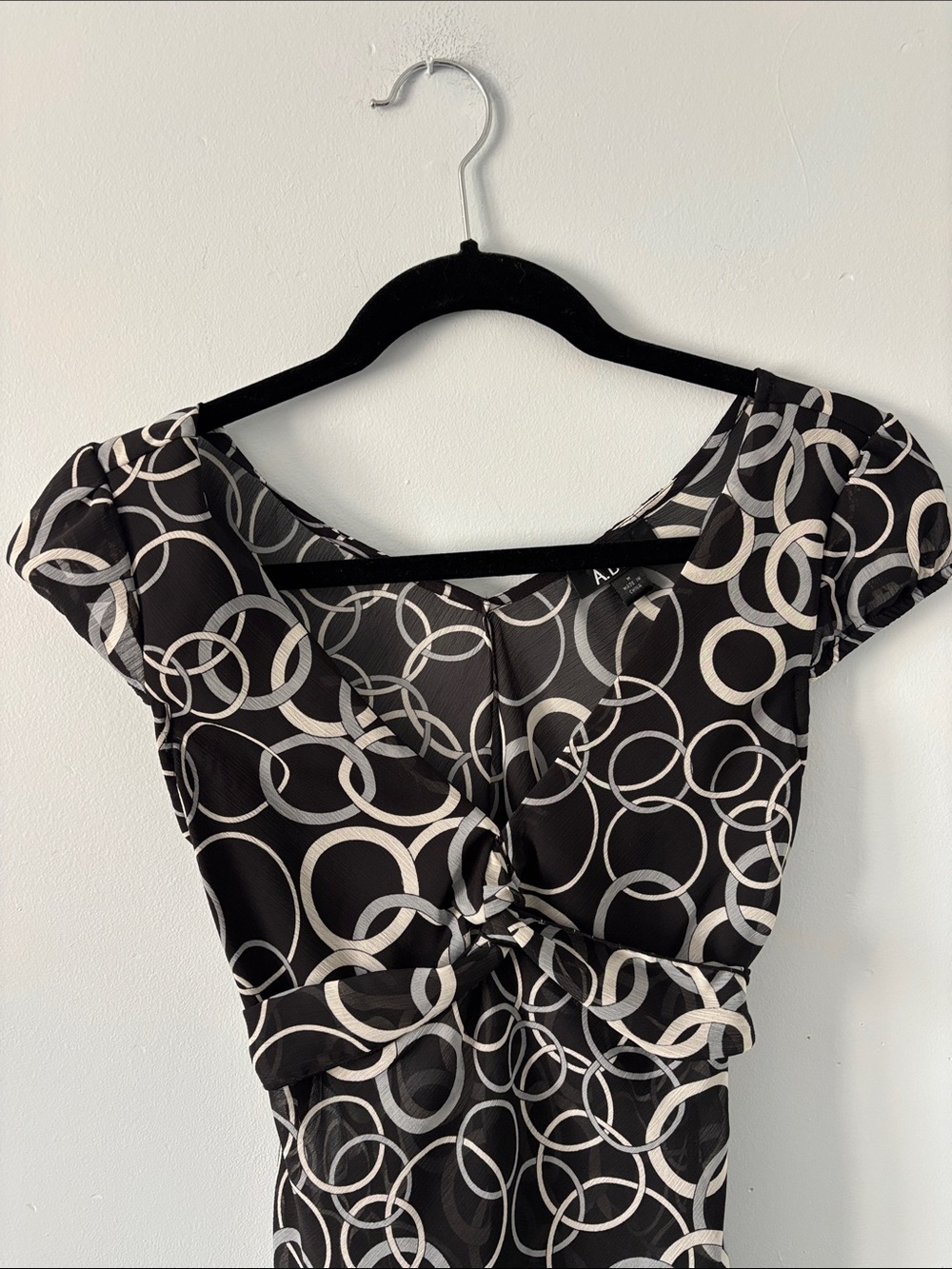 A. Byer Black Blouse with White Ring Print and Front Knot - Picture 2 of 8